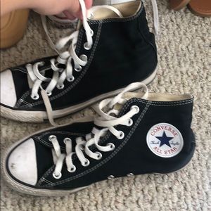 Black high top converse shoes